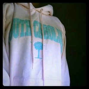 This is a pastel pink "South Carolina" hoodie